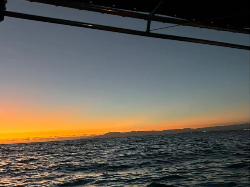 Sunset over Banderas Bay seen from the boat