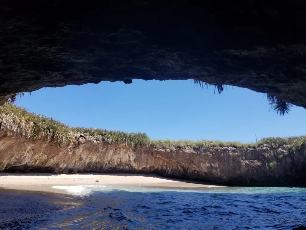 View of the hidden beach from inside the sea cave
