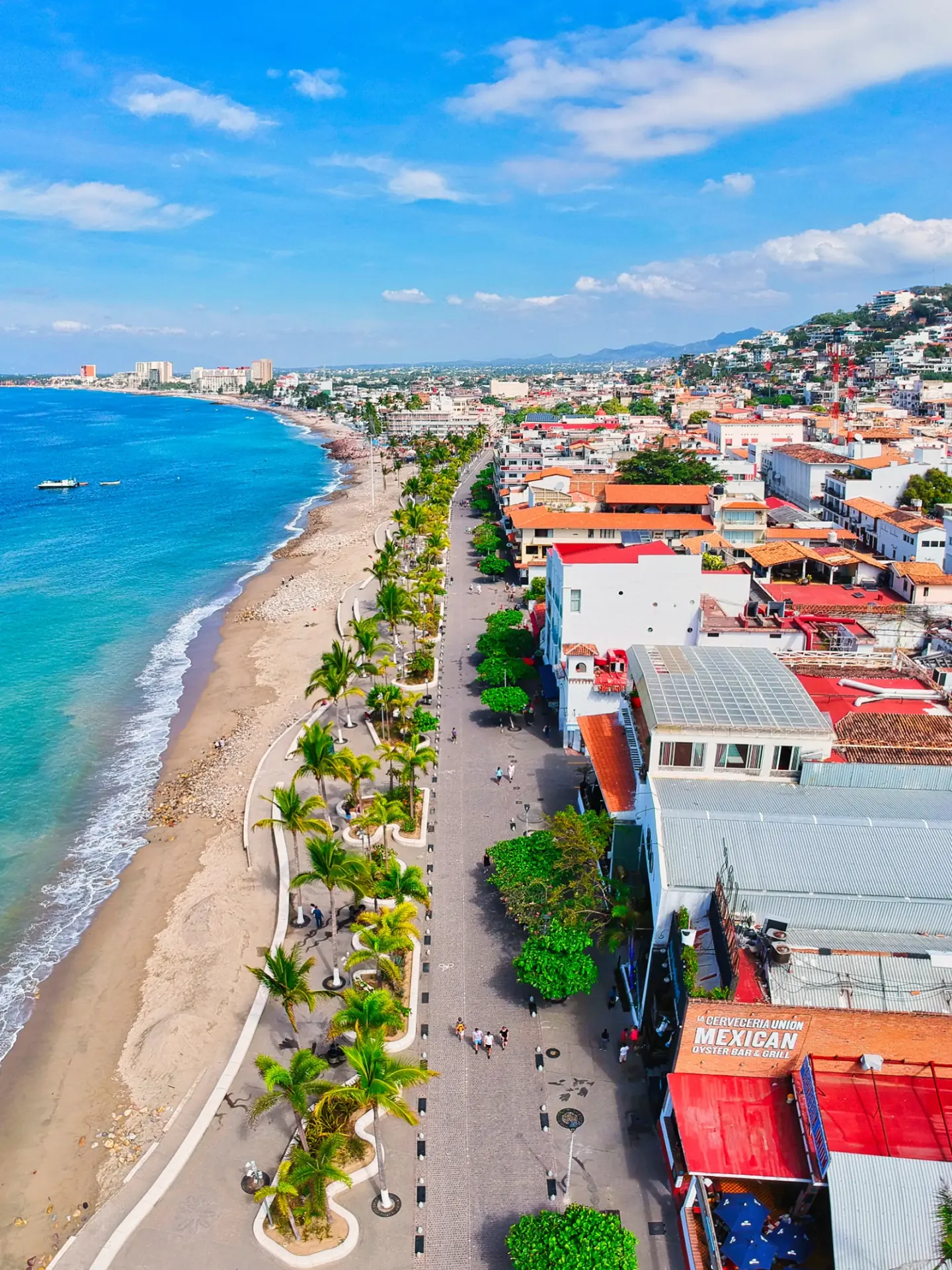 Aerial view of the Puerto Vallarta Malecón and Historic Center with tile roofs